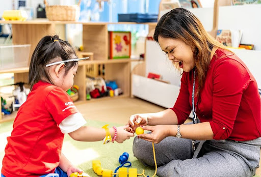 Teacher and students are learning through play at International Preschool Saigon Pearl 